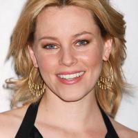 Julie Bowen vs. Elizabeth Banks:  Who wins this matchup of perky blondes?
